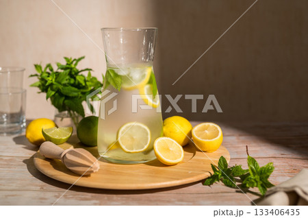 Lemonade with lemons, limes and fresh mint. Refreshing, homemade lemonade. Copy space Lemonade with lemons, limes and fresh mint. Refreshing, homemade lemonade. Copy space 133406435