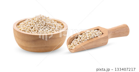 pile of pearl barley in wood bowl scoop isolated on white background ( image from camera ) 133407217
