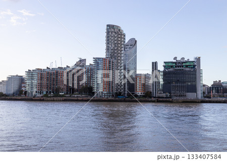 Riverfront skyline of modern residential towers and apartments 133407584