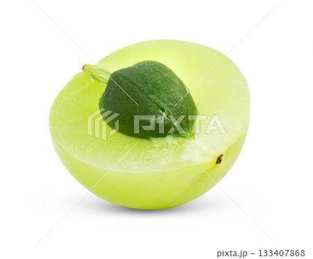 Fresh half Indian gooseberries on white background Fresh half Indian gooseberries on white background 133407868