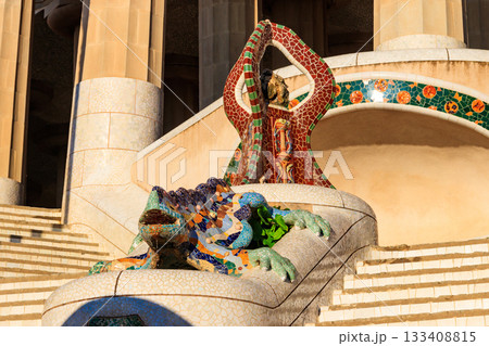Multicolored mosaic dragon salamander of Gaudi in Park Guell, Barcelona, Spain 133408815
