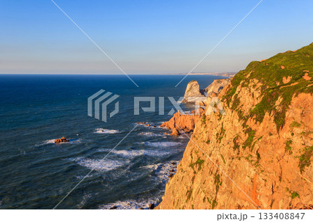 View of the Atlantic Ocean from Cabo da Roca. Cabo da Roca or Cape Roca is westernmost cape of mainland Portugal, continental Europe and the Eurasian land mass 133408847