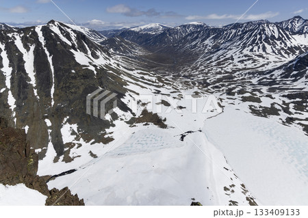 Snowy landscape viewed from high above Leirvassbu in Jotunheimen National Park during late winter 133409133