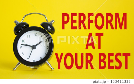 Perform at your best symbol. Beautiful yellow background with alarm clock. Business and Perform at your best concept. Copy space. Perform at your best symbol. Beautiful yellow background with alarm clock. Business and Perform at your best concept. Copy space. 133411335
