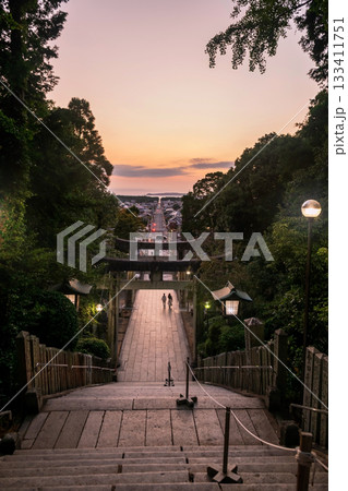 torii gate and city view from Miyajidake temple at sunset, Fukuoka 133411751