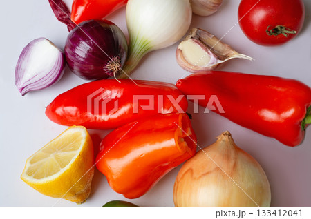 Fresh beautiful ripe organic vegetables against white background. flat lay Fresh beautiful ripe organic vegetables against white background. flat lay 133412041