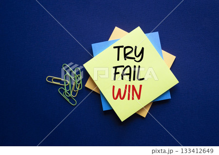 Try Fail Win symbol. Sticky notes with words Try Fail Win. Beautiful deep blue background. Business and Try Fail Win concept. Copy space. 133412649