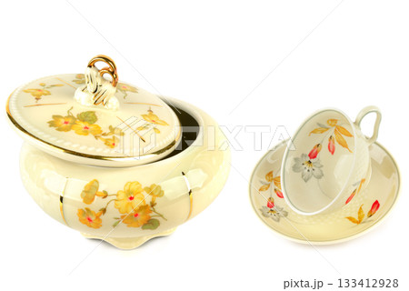 Vintage Porcelain Sugar Bowl and Tea Cup Set Isolated on White Vintage Porcelain Sugar Bowl and Tea Cup Set Isolated on White 133412928