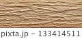 Textured surface showcasing a natural beige pattern with subtle lines and depth. 133414511