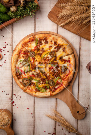Mexican style pizza with jalapeno peppers 133414557