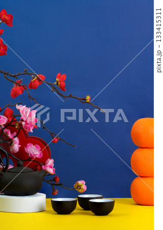 Lunar New Year background with tea set and decorative elements 133415311