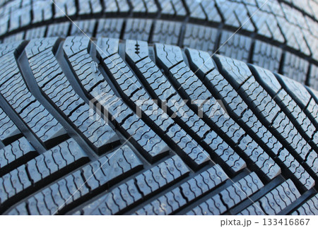 Silica Tire Technology. Deepest Grooves and Sipes Of Modern Tires with High Silica Contents for Hard Winter Conditions 133416867