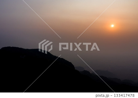 PM 2.5 in Sunrise view with the mountain foreground at Chiang Rai province, North of Thailand on 25 Mar 2021 morning 7.00 am. PM 2.5 in Sunrise view with the mountain foreground at Chiang Rai province, North of Thailand on 25 Mar 2021 morning 7.00 am. 133417478