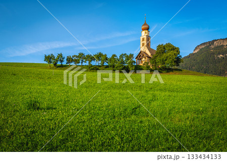 Church of St Valentin on the green field in Dolomites 133434133