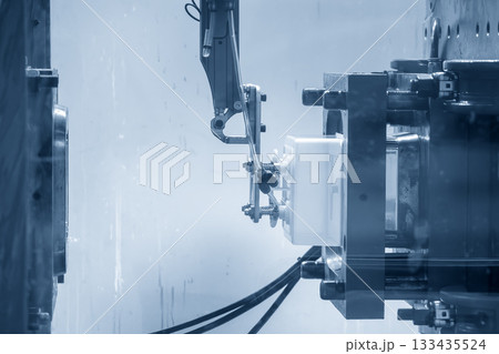 The food container production process by plastic injection mold machine in the blue scene. The food container production process by plastic injection mold machine in the blue scene. 133435524