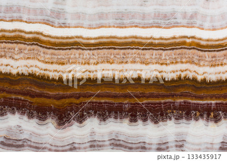 Onyx different tones of yellow-brown color. 133435917