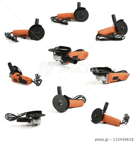 Nine Powerful angle grinder with abrasive disk isolated on a white background. Nine Powerful angle grinder with abrasive disk isolated on a white background. 133436638