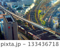 ミニチュアジオラマ風写真　スカイプロムナードから見た名古屋駅に向かう新幹線 133436718