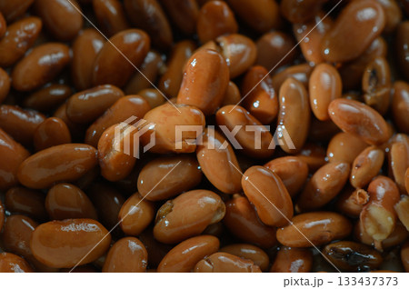 Exploring the rich texture and color of freshly harvested brown beans gathered for culinary creations Exploring the rich texture and color of freshly harvested brown beans gathered for culinary creations 133437373