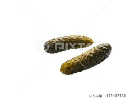 Two barrel-salted cucumbers on white background Two barrel-salted cucumbers on white background 133437586