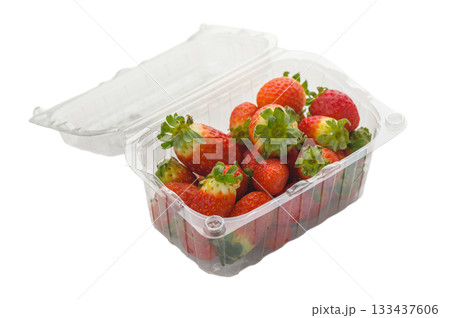 Plastic container with fresh strawberries on white 133437606
