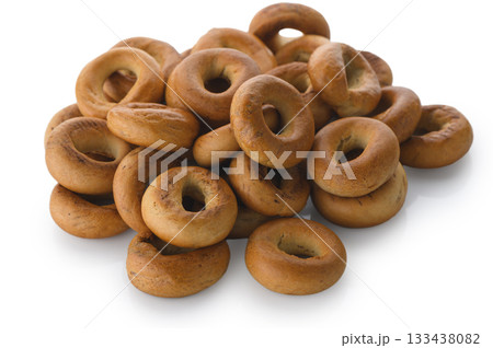 Heap of traditional Russian sushki on white background Heap of traditional Russian sushki on white background 133438082
