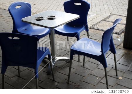 Chair and table in a city cafe on the seafront in Tel Aviv. Chair and table in a city cafe on the seafront in Tel Aviv. 133438769