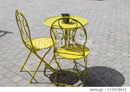 Chair and table in a city cafe on the seafront in Tel Aviv. 133439042