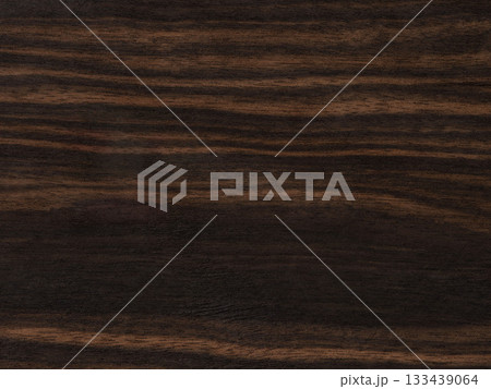 Makassar ebony veneer with luxurious dark streaks and rich chocolate undertones/ Makassar ebony veneer with luxurious dark streaks and rich chocolate undertones/ 133439064