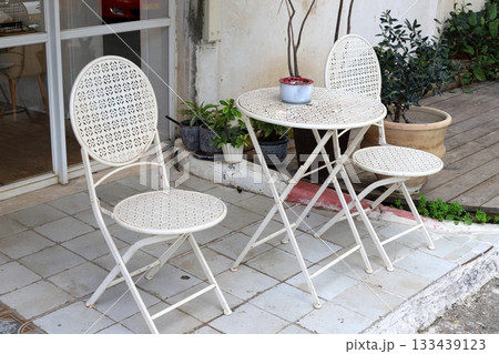 Chair and table in a city cafe on the seafront in Tel Aviv. 133439123