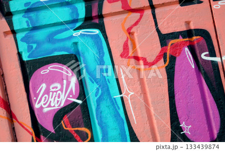 Colorful background of graffiti painting artwork with bright aerosol outlines on wall. Old school street art piece made with aerosol spray paint cans. Contemporary youth culture backdrop Colorful background of graffiti painting artwork with bright aerosol outlines on wall. Old school street art piece made with aerosol spray paint cans. Contemporary youth culture backdrop 133439874