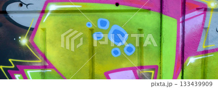 Colorful background of graffiti painting artwork with bright aerosol outlines on wall. Old school street art piece made with aerosol spray paint cans. Contemporary youth culture backdrop Colorful background of graffiti painting artwork with bright aerosol outlines on wall. Old school street art piece made with aerosol spray paint cans. Contemporary youth culture backdrop 133439909