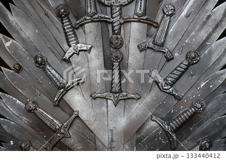Metal knight swords background close up. The concept Knights Metal knight swords background close up. The concept Knights 133440412