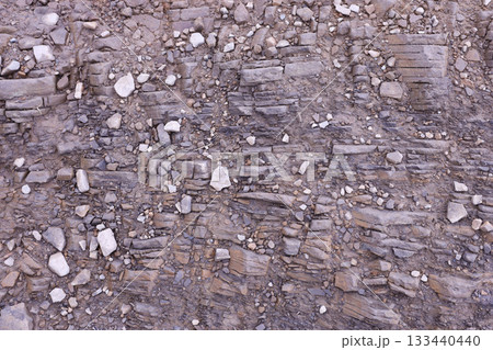 Background of shattered stony stones surface in mountain area. Flat texture with natural light Background of shattered stony stones surface in mountain area. Flat texture with natural light 133440440