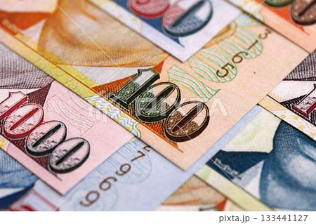Singapore Dollar currency money bills. SGD currency banknotes in stack with different denomination close up Singapore Dollar currency money bills. SGD currency banknotes in stack with different denomination close up 133441127