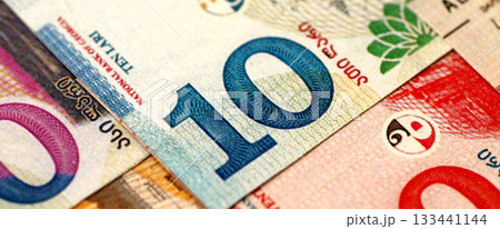 Georgian Lari currency money bills. GEL currency banknotes in big amount with different denomination close up Georgian Lari currency money bills. GEL currency banknotes in big amount with different denomination close up 133441144