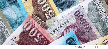 Hungarian Forints currency money bills in big amount. Pile of HUF currency banknotes with different denomination close up Hungarian Forints currency money bills in big amount. Pile of HUF currency banknotes with different denomination close up 133441169