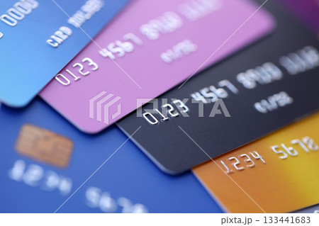 Many credit or debit cards with fictional specimen numbers. Big amount of banking plastic cards of various colors. Financial concept of business and e-commerce Many credit or debit cards with fictional specimen numbers. Big amount of banking plastic cards of various colors. Financial concept of business and e-commerce 133441683