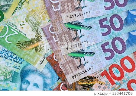 New Zealand dollar money bills in big amount on table close up. Rich life concept in New Zealand. Business and economy 133441709