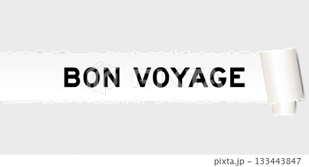 Ripped gray paper background that have word bon voyage under torn part 133443847