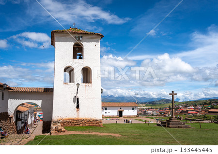 Colonial church in Chinchero, Peru, with white adobe bell tower 133445445