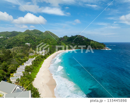 The dynamic ocean waves create an idyllic and vibrant beach experience. Seychelles, Mahe. Anse Intendance beach. 133445898