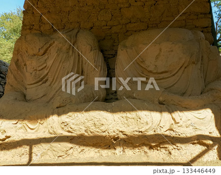 Heritage Gandhara stone sculptures showing monastic life and artistic decay in Taxila ruins Heritage Gandhara stone sculptures showing monastic life and artistic decay in Taxila ruins 133446449