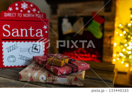 Santa Mailbox with Christmas Gifts and Festive Holiday Decor Indoors Santa Mailbox with Christmas Gifts and Festive Holiday Decor Indoors 133448183