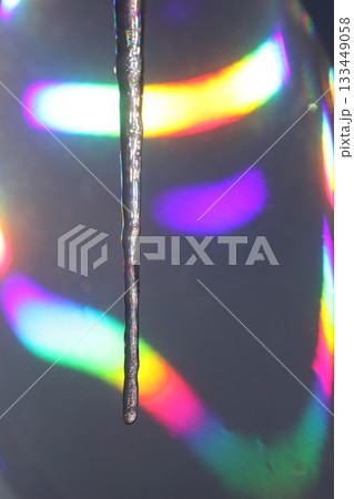 icicles are melting in colorful light 133449058