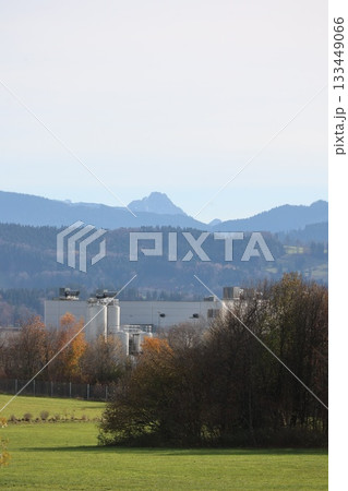 Industrial facility with mountains in the background Industrial facility with mountains in the background 133449066