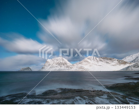 Norway. Night in the fjord. Cloud movement during long exposure.  133449153