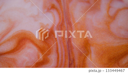 Splash art. Ink background. Defocused orange bronze color flowing particles water stains liquid floating on creative art abstraction. Splash art. Ink background. Defocused orange bronze color flowing particles water stains liquid floating on creative art abstraction. 133449467