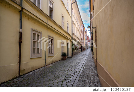 Prague, Czech Republic, August 9, 2023. A charming cobblestone alley in the Old Town. Perspective view. Travel destinations. 133450187