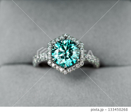 A blue diamond ring with a white band A blue diamond ring with a white band 133450268